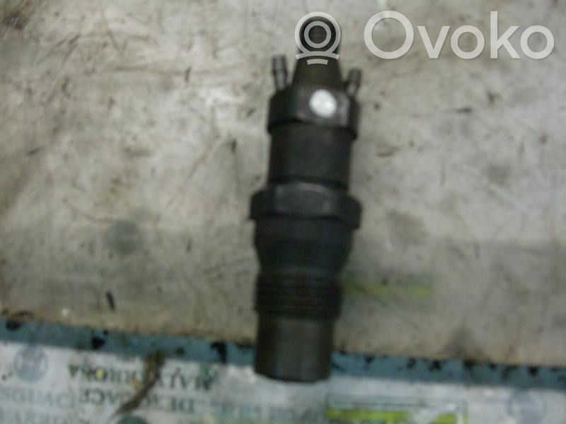 Inyector de combustible