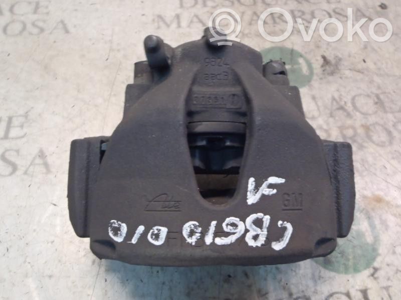 Opel Astra G Zacisk hamulcowy przedni 