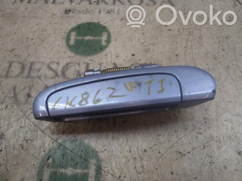 Manecilla externa puerta trasera
