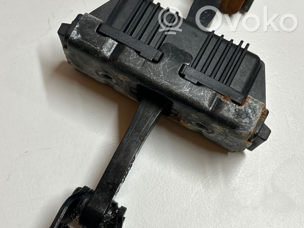 Front door check strap stopper   7176807