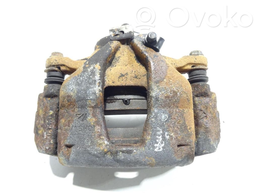 Opel Combo D Front brake caliper 