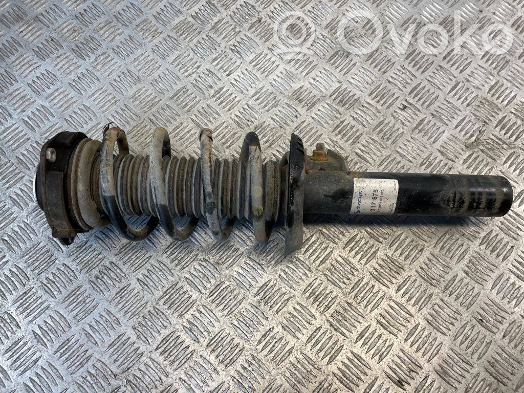Volkswagen PASSAT B7 Priekšpusē amortizators 