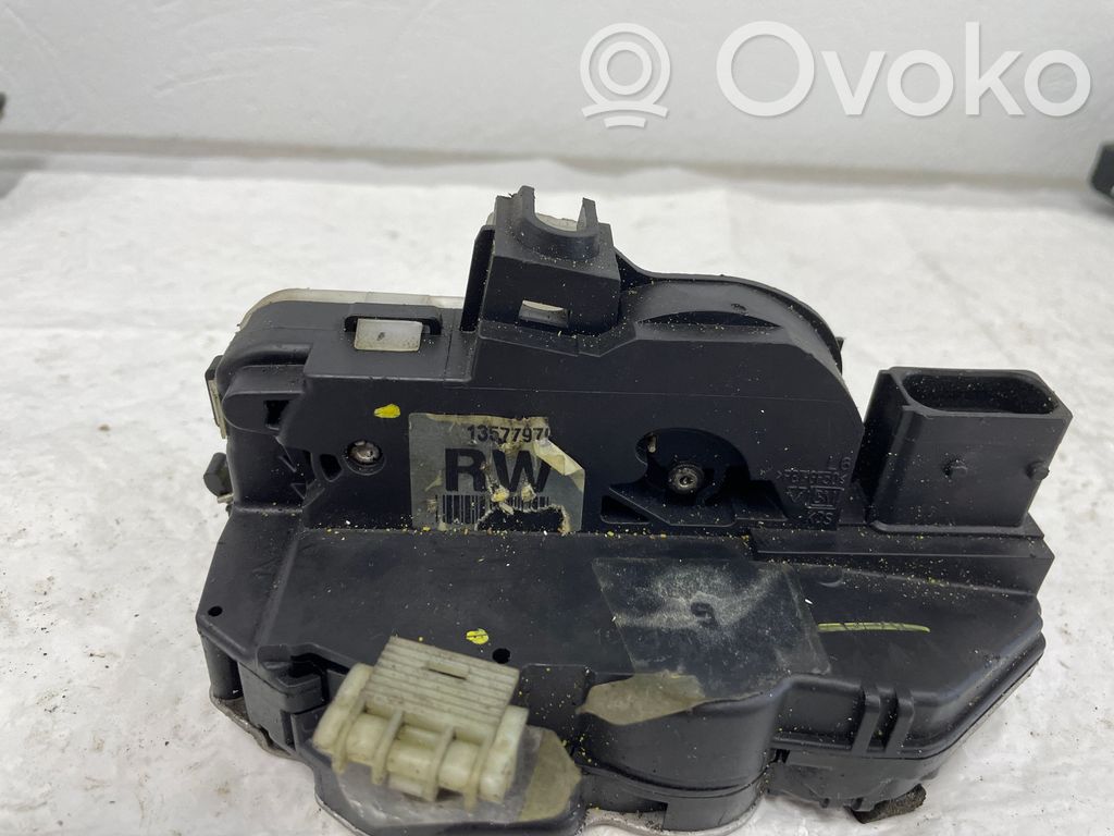 Opel Astra J Zamek drzwi przednich 