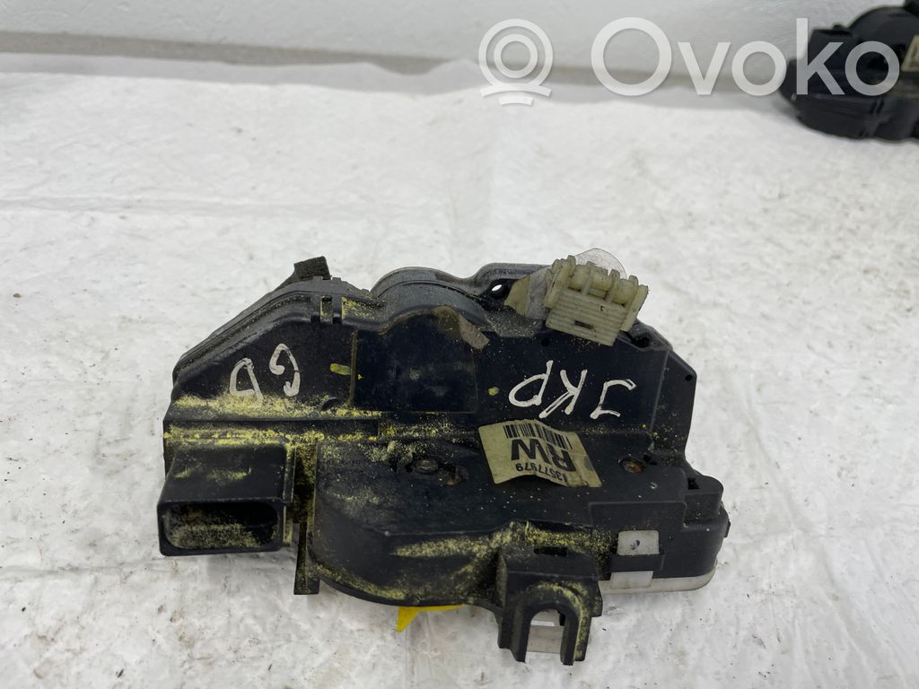 Opel Astra J Zamek drzwi przednich 
