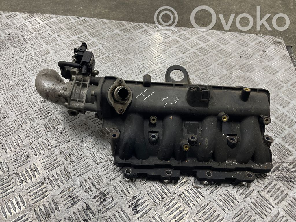 Opel Astra J Kolektor ssący 