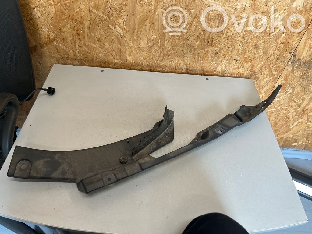 Volvo XC60 Uchwyt / Mocowanie błotnika przedniego 