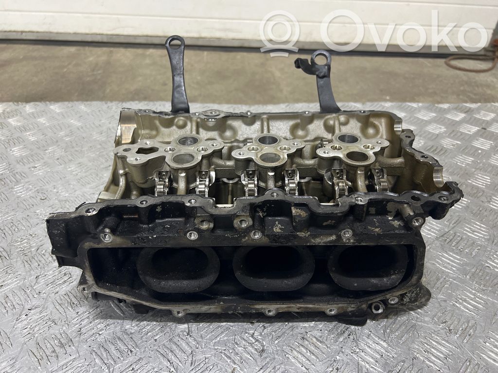 Engine head   06M103404AF