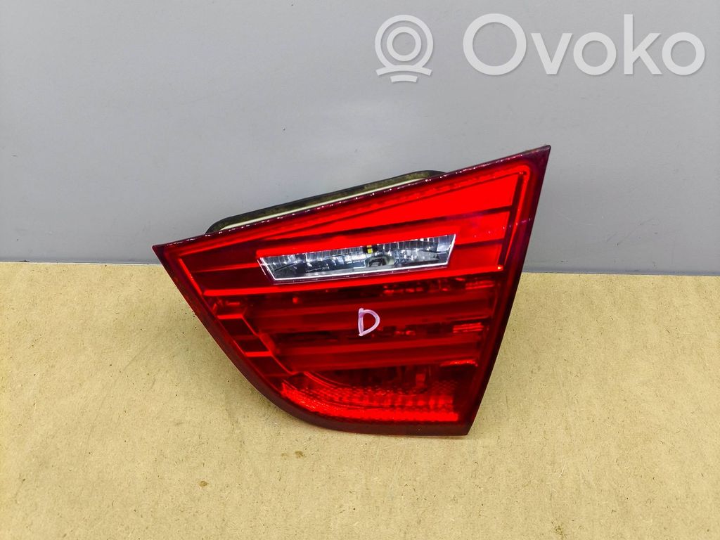 BMW 3 E90 E91 Aizmugurējais lukturis pārsegā 