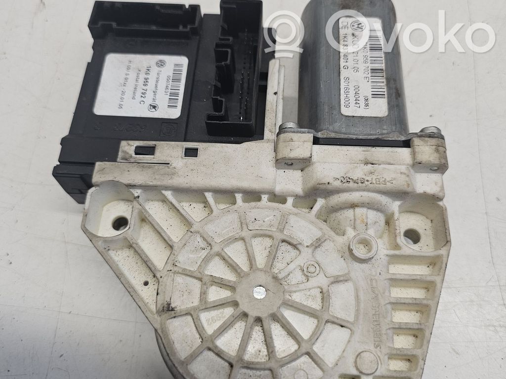 Volkswagen Touran I Priekinio lango pakelėjo varikliukas 