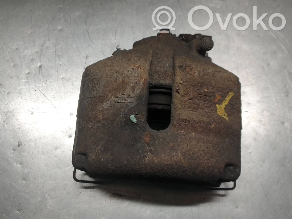 Volkswagen PASSAT B7 Front brake caliper 