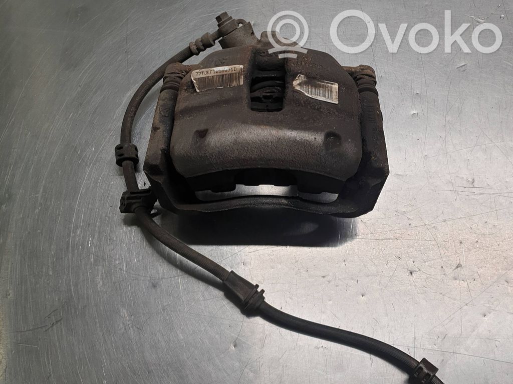 Peugeot Partner III Front brake caliper 