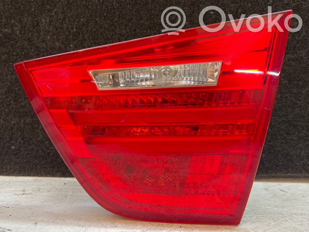 BMW 3 E90 E91 Aizmugurējais lukturis pārsegā 