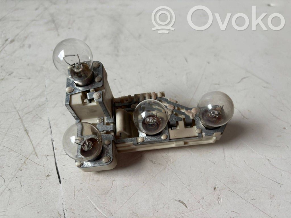 Tail light bulb cover holder   710076