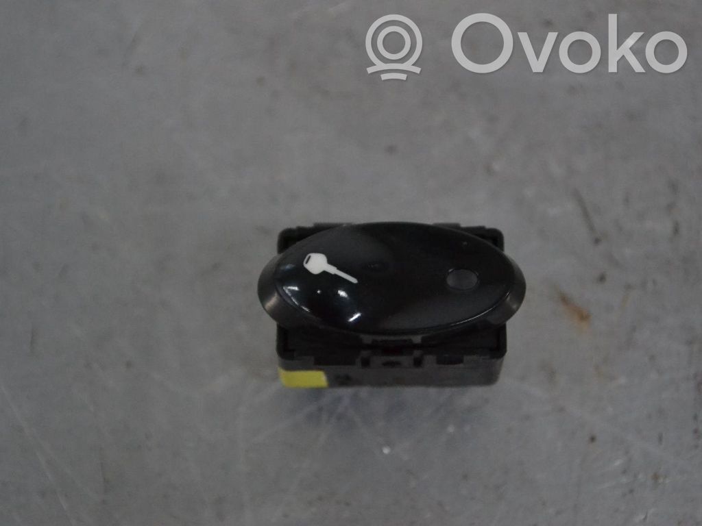 Botón interruptor de bloqueo de puertas   98661314400