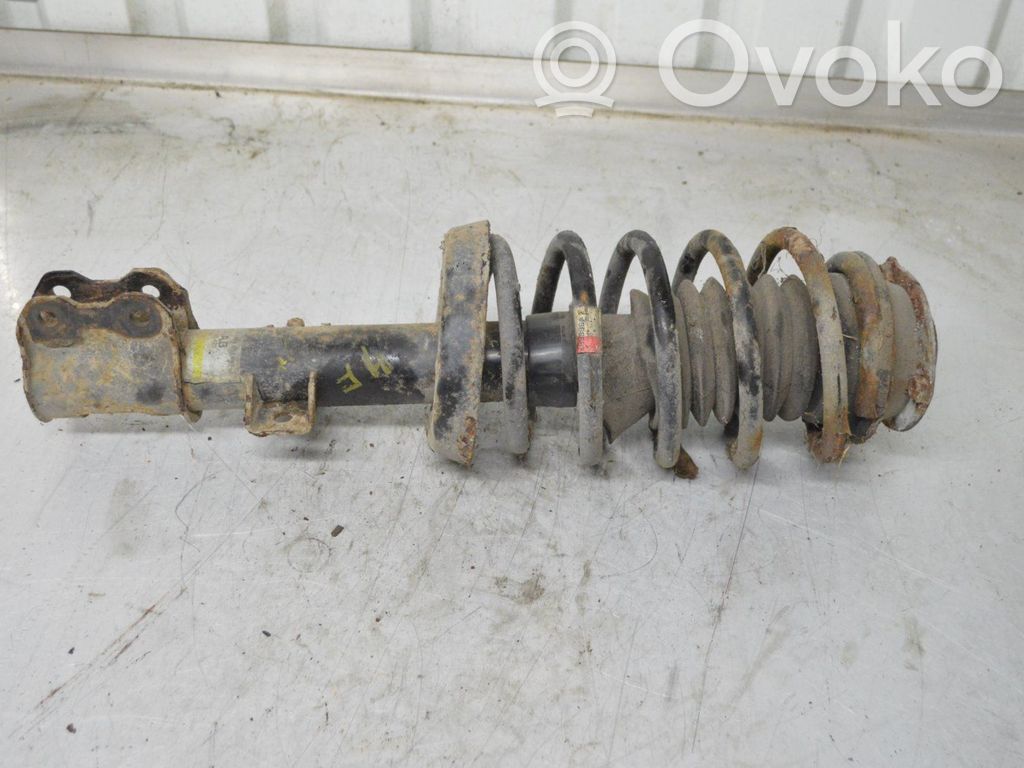 Front shock absorber with coil spring