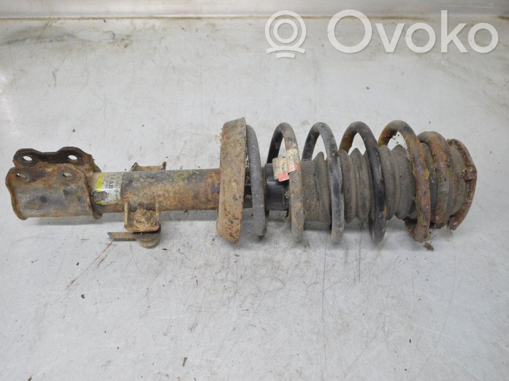 Front shock absorber with coil spring