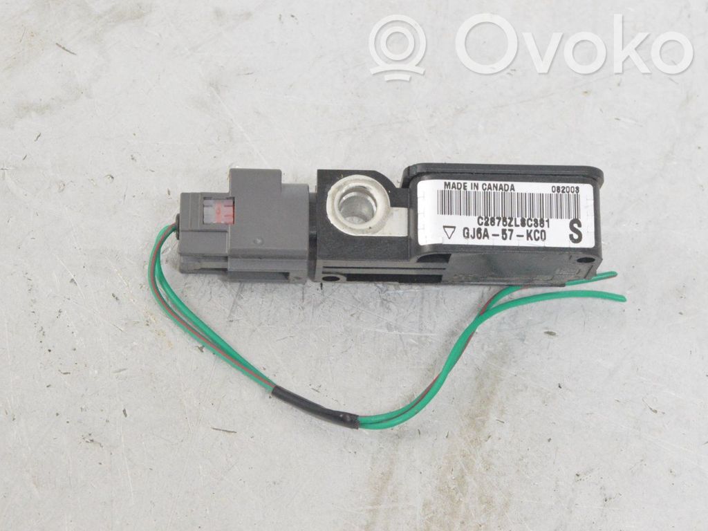 Czujnik uderzenia Airbag   GJ6A57KC0