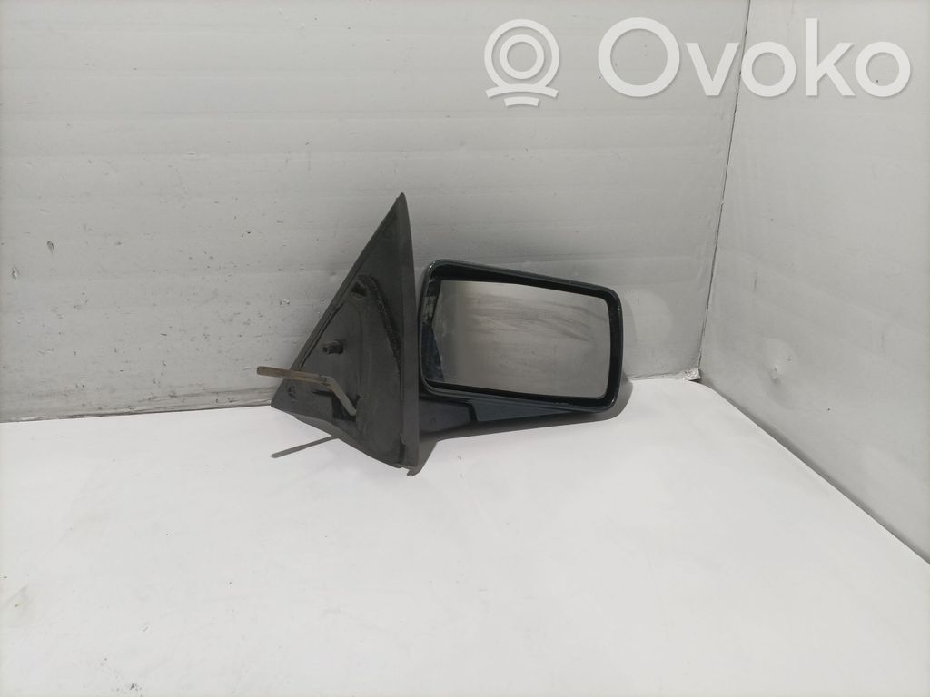 Ford Escort Зеркало (управляемое электричеством) 