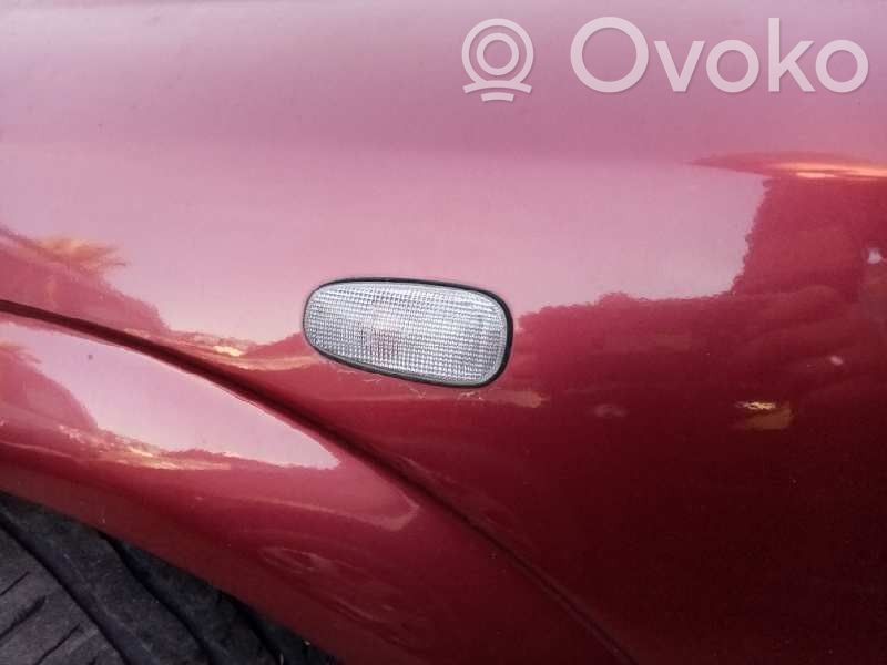 Opel Astra G Kierunkowskaz błotnika przedniego 