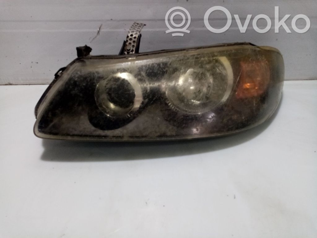 Nissan Almera N16 Lampa przednia 