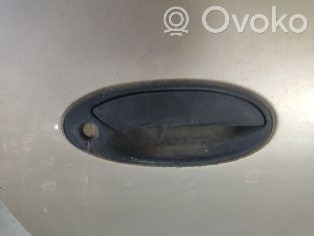 Mitsubishi Colt Manecilla externa puerta delantera 