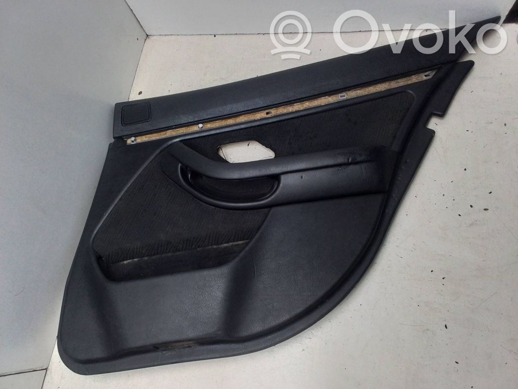 BMW 5 E39 Apmušimas galinių durų (obšifke) 