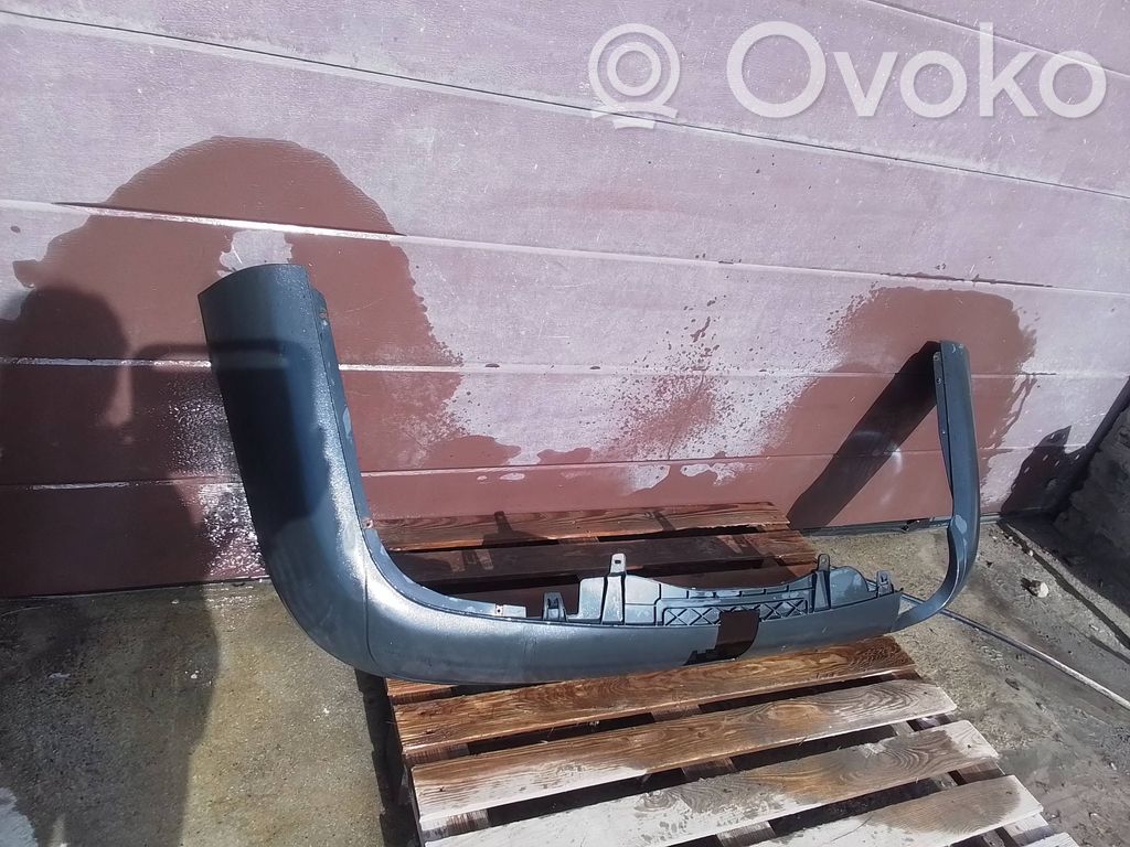Volkswagen PASSAT B6 Moldura inferior del parachoques trasero 