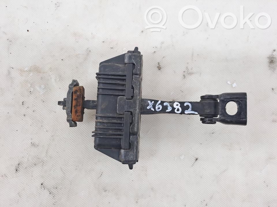 Front door check strap stopper   7193671,X6382