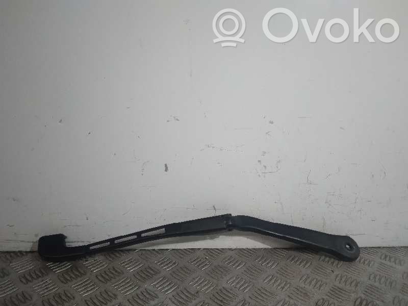 Front wiper blade arm
