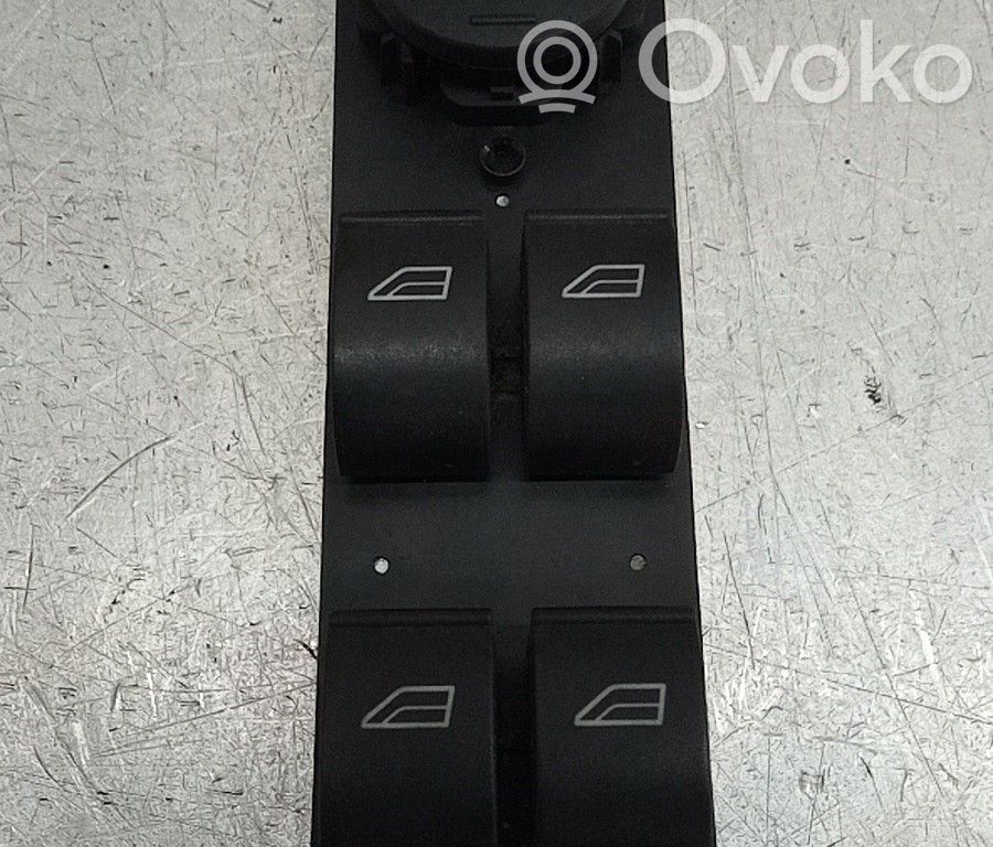 Electric window control switch   7M5T14A132AB