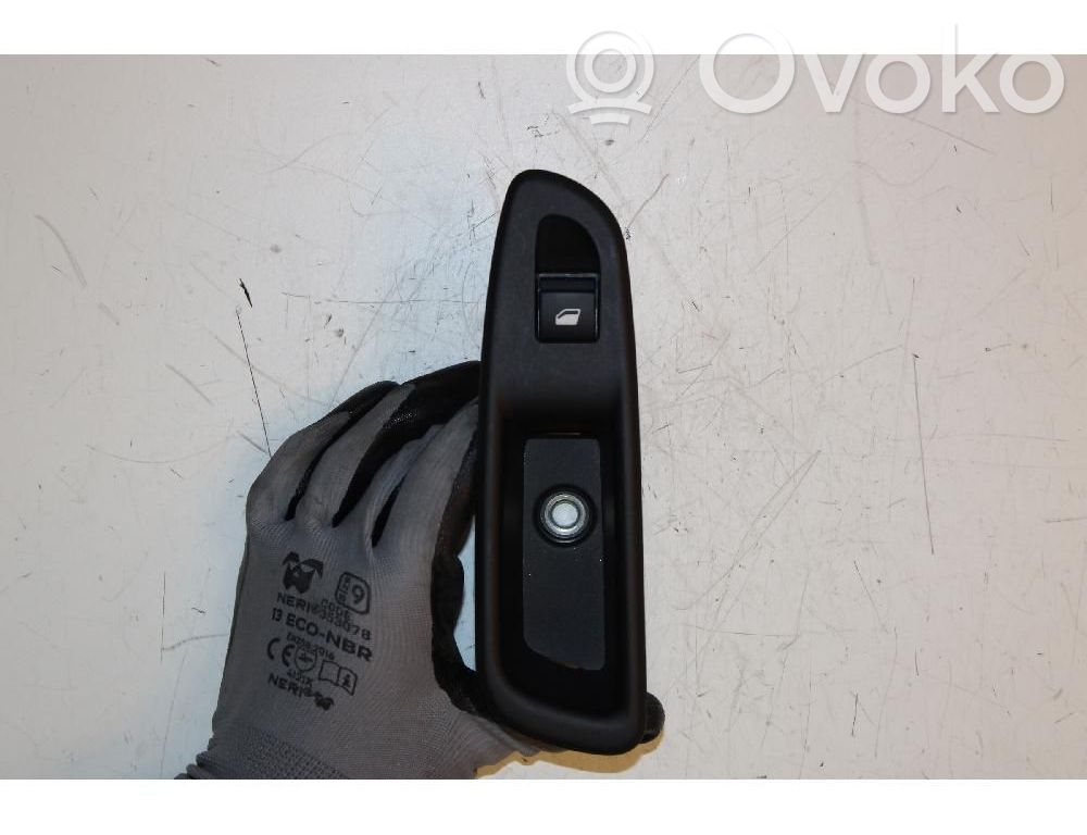 Interruptor del elevalunas eléctrico   7357709510
