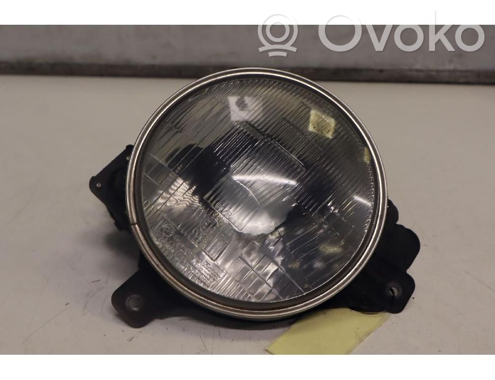 SsangYong Korando Lampa przednia 