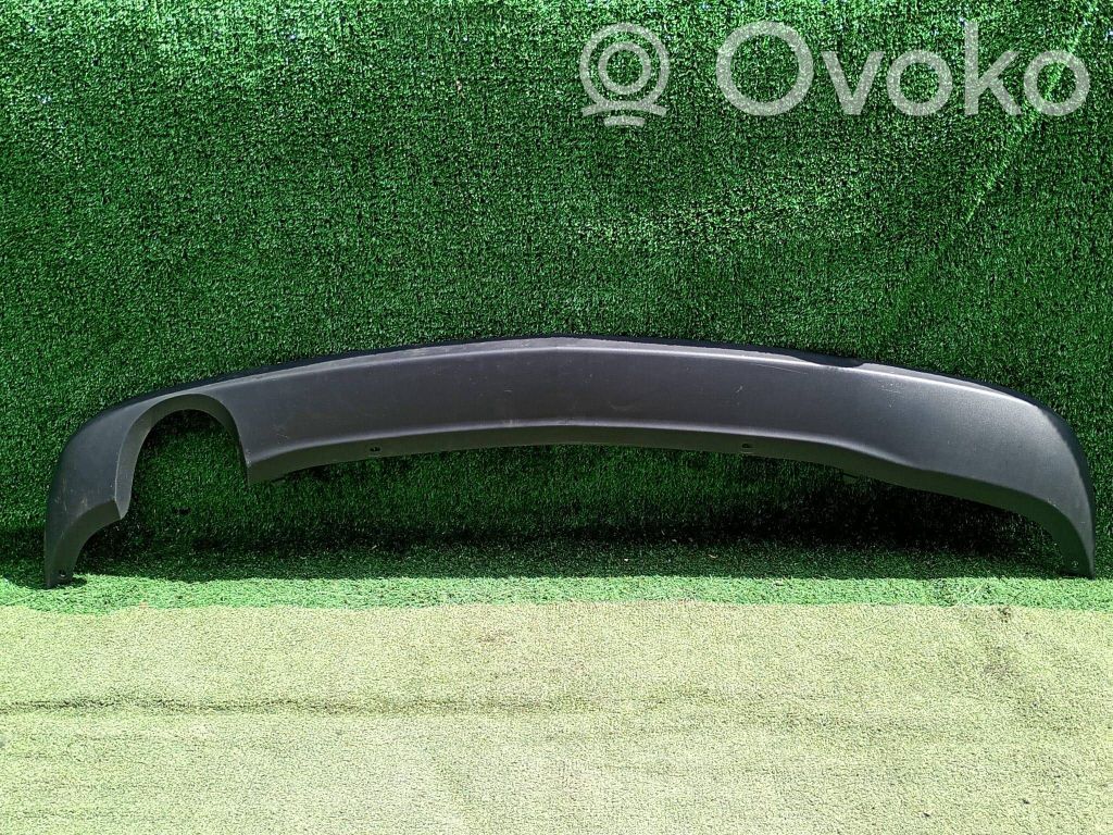 Opel Astra J Moldura inferior del parachoques trasero 