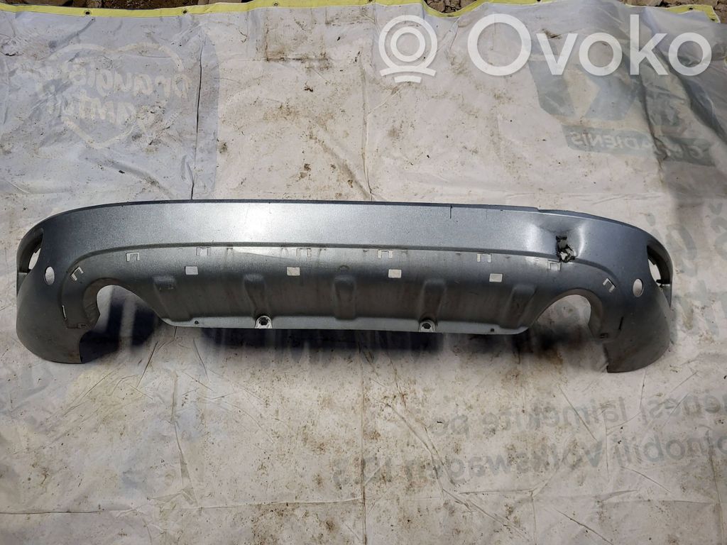 Volvo XC60 Moldura inferior del parachoques trasero 