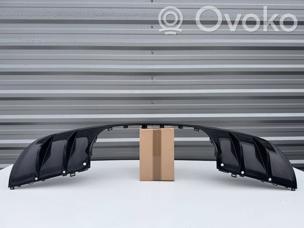 Porsche Cayenne (9Y0 9Y3) Moldura inferior del parachoques trasero 