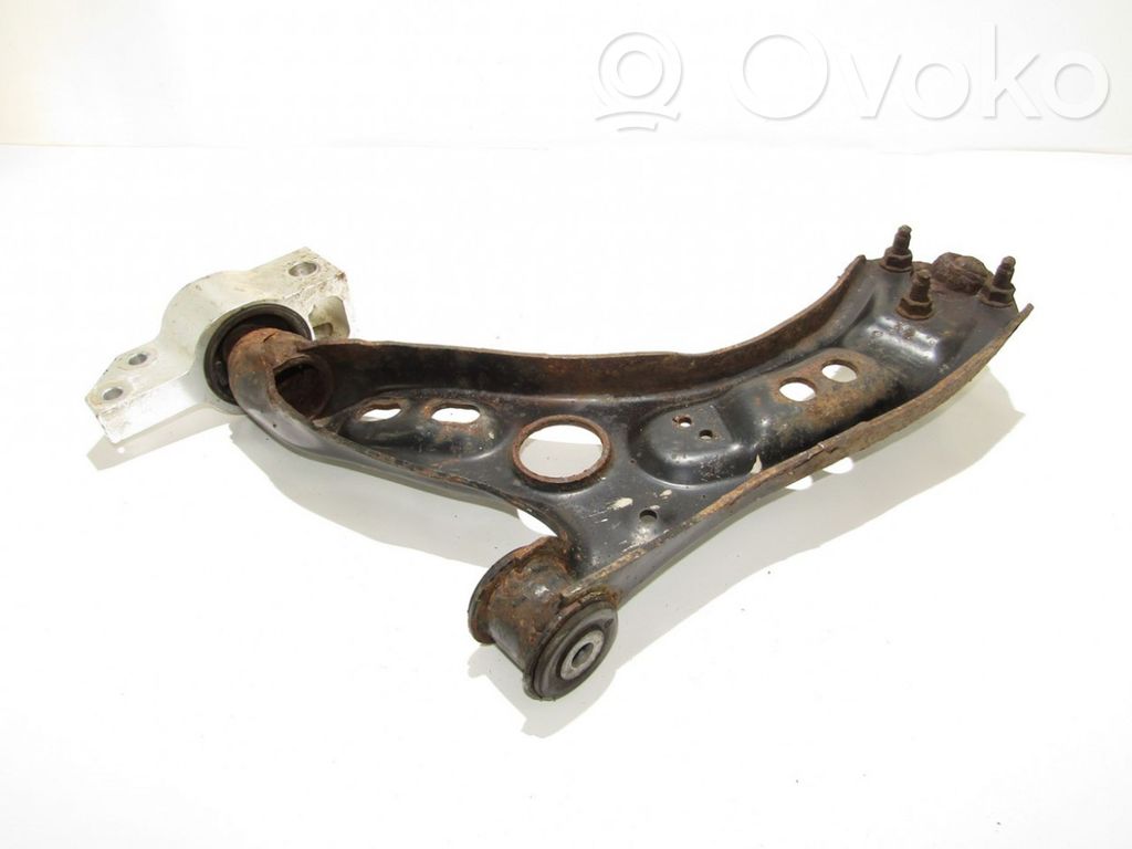 Volkswagen PASSAT B7 Braccio di controllo sospensione anteriore inferiore/braccio oscillante