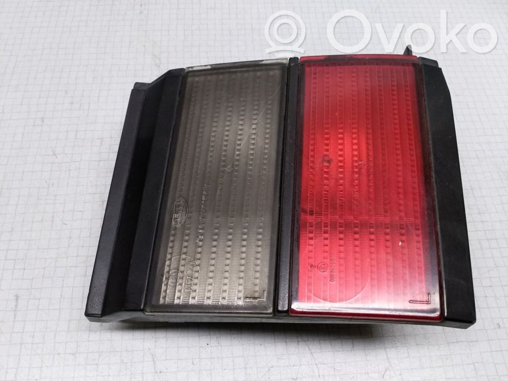 Volkswagen PASSAT B3 Aizmugurējais lukturis pārsegā 
