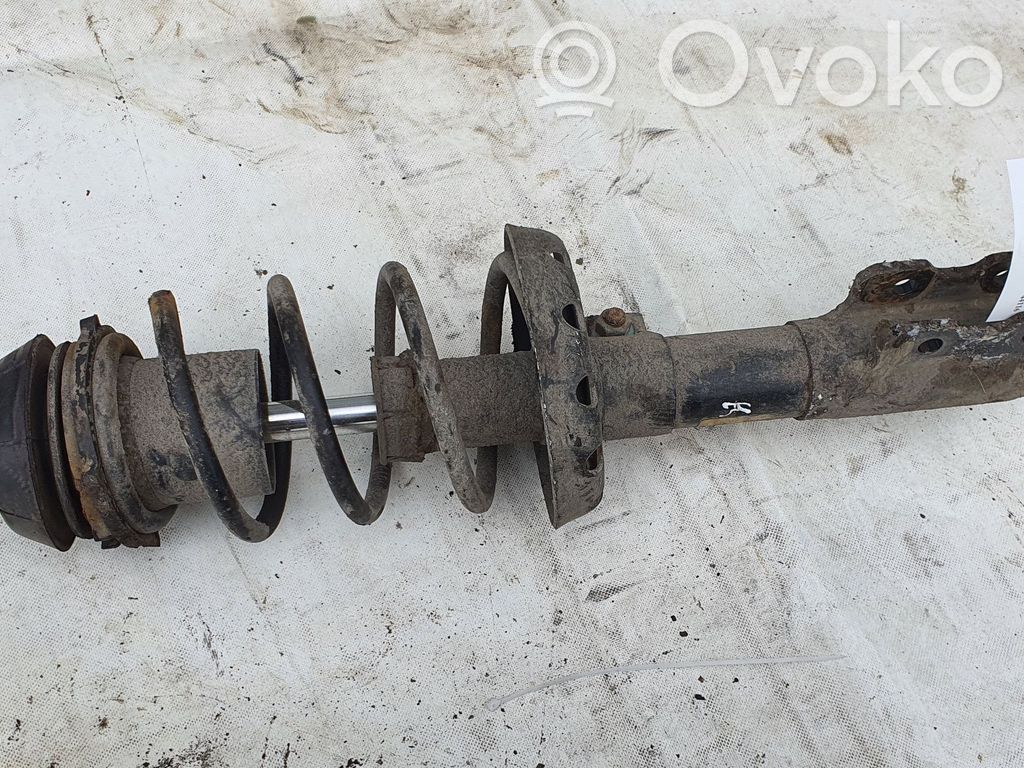 Opel Astra G Amortyzator osi przedniej ze sprężyną 