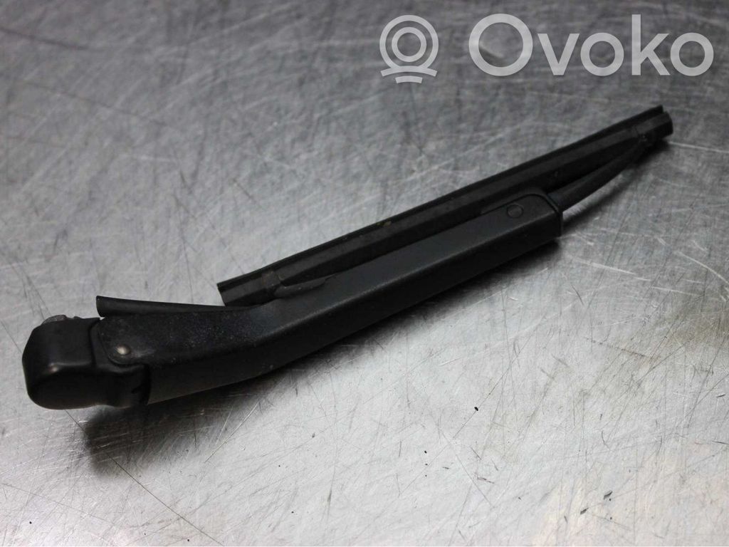 Headlight wiper arm