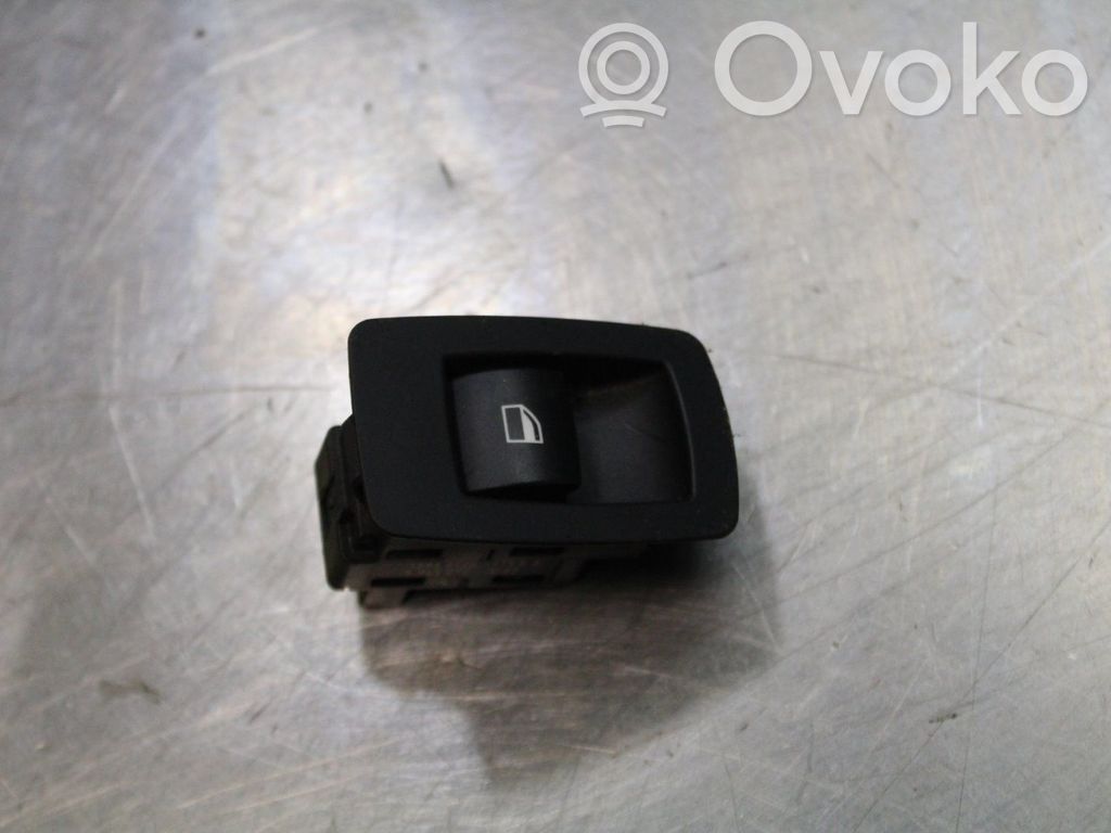 Electric window control switch   6945874,15939900