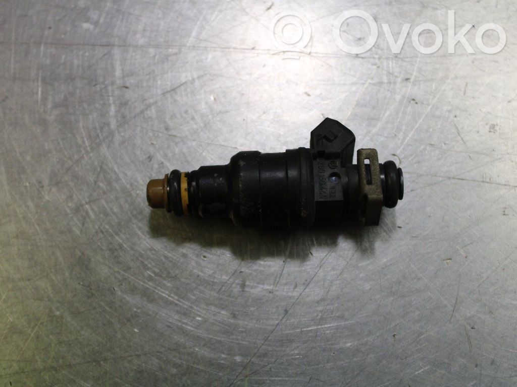 Inyector de combustible   06A906031