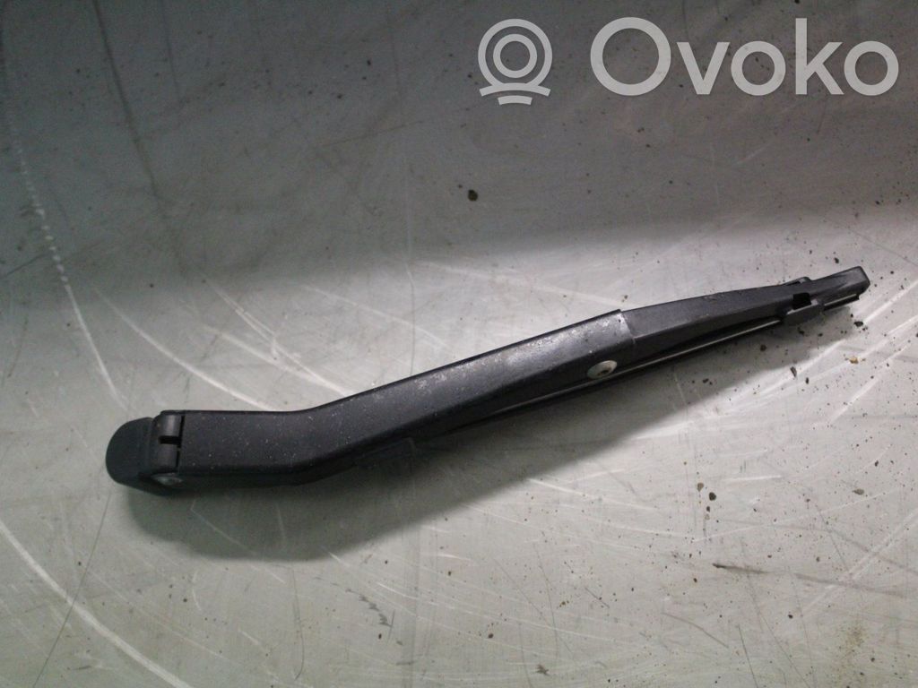Headlight wiper arm
