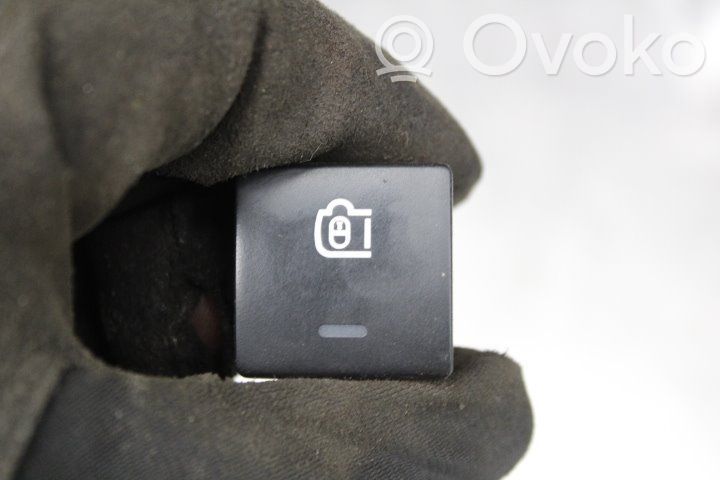 Botón interruptor de bloqueo de puertas