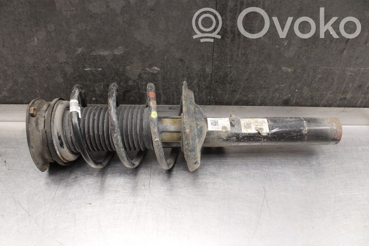 Volkswagen Tiguan Amortyzator osi przedniej ze sprężyną 