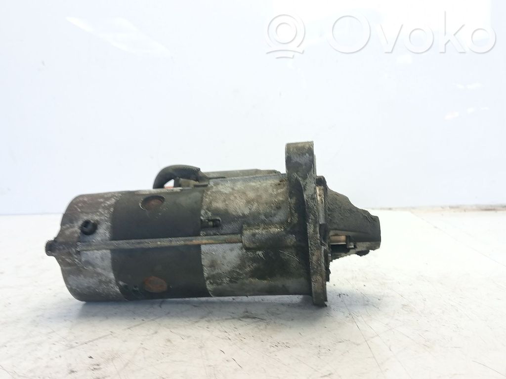 Стартер   RF5C18400