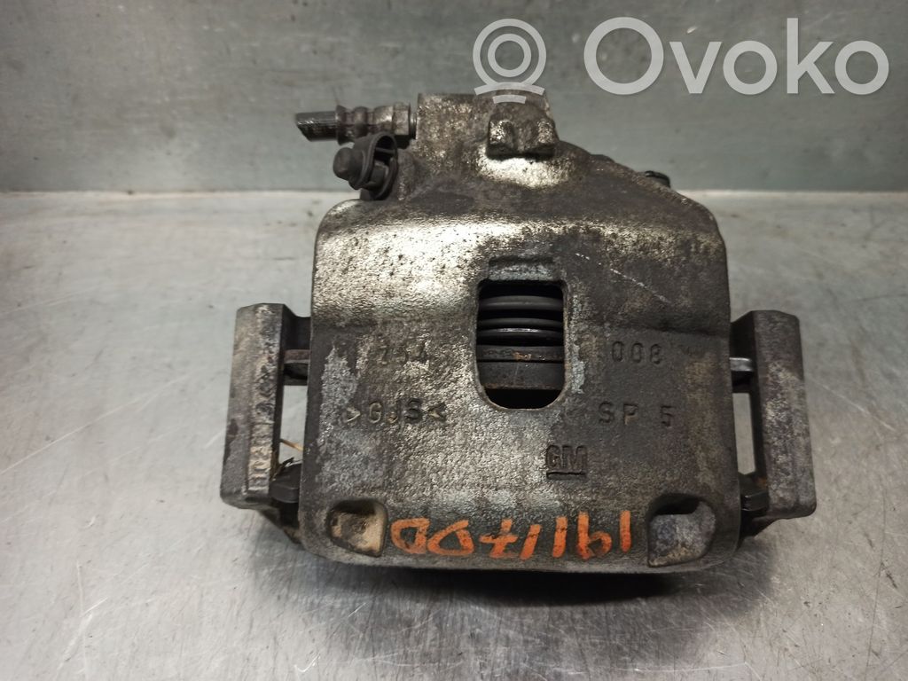 Opel Corsa E Zacisk hamulcowy przedni 