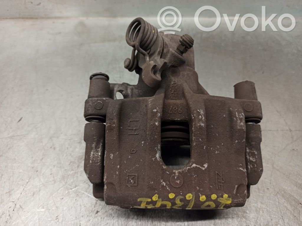 Ford Focus Tylny zacisk hamulcowy 