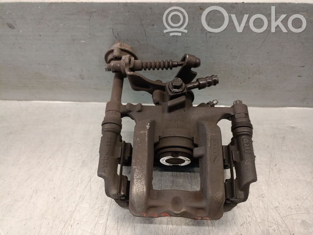 Opel Astra H Mocowanie / Zacisk hamulca tylnego 