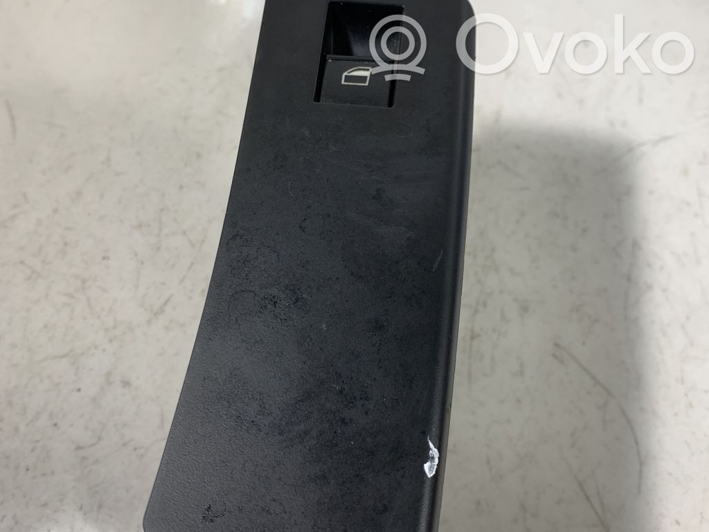 Electric window control switch   6952800