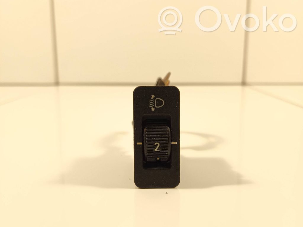 Headlight level height control switch   8360460